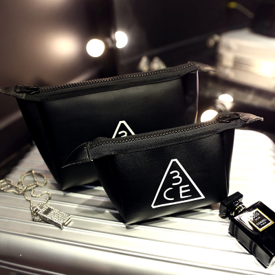 Sweet waterproof triangle leather cometic bag storage bag
